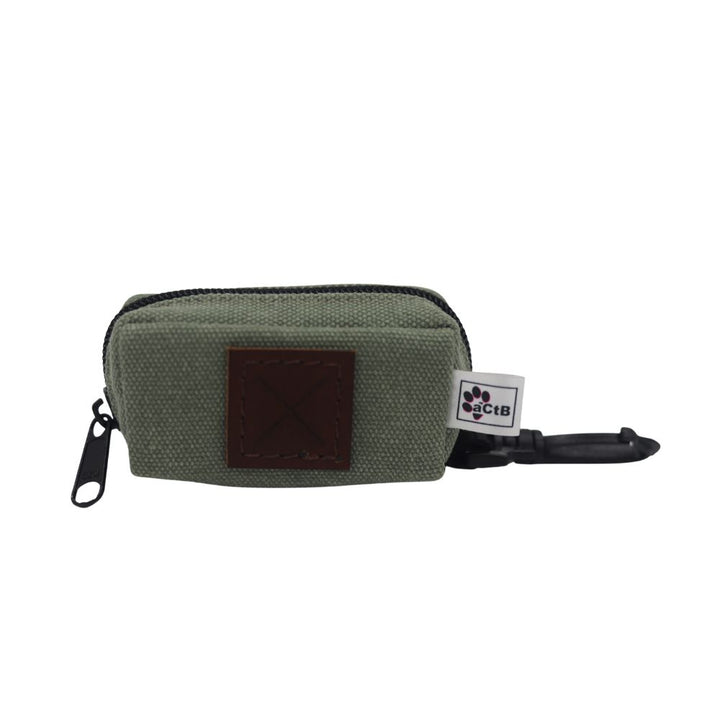 Sage Green utility pouch made from Zambezi Canvas with a leather dispenser patch on the side with a belt clip for attaching to a lead/belt/loop. 